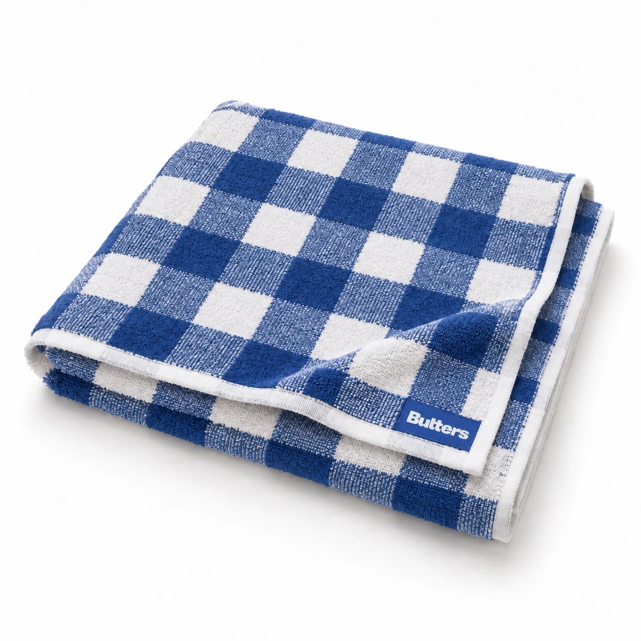Blue-and-white checked Butters picnic towel on a white background